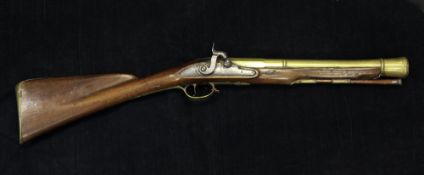 A late 18th century Irish percussion cap blunderbuss, the brass barrel with three proof marks and