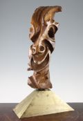 A 20th century carved oak abstract sculpture, depicting a smiling face, marked and dated with the