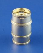 An early 1970's silver barrel shaped pepper mill, with reeded bands, William Comyns & Sons Ltd,