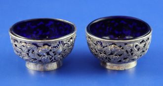 A pair of late 19th/early 20th century Chinese pierced silver tub shaped salts by Wang Hing & Co,