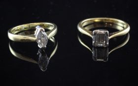 Two 18ct gold and solitaire diamond rings, set with either marquise or emerald cut diamonds, sizes J