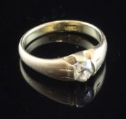 An 18ct gold and claw set solitaire diamond ring, with old mine cut stone, size Q.