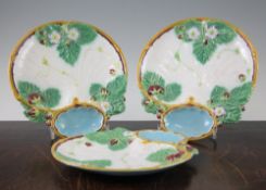 Three Minton majolica shell shape strawberry dishes, c.1867, each dish with moulded strawberries,