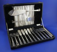 A cased set of six pairs of late 1940's/early 1950's Art Deco style fish eaters and matching fish