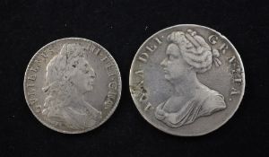 A Queen Anne 1706 silver crown, VG/F and a William III 1697 NONO silver halfcrown, F
