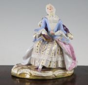 A Meissen figure of the Good Housekeeper, late 19th century, modelled as an elegantly dressed seated
