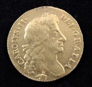 A Charles II 1678 gold guinea, elephant and castle mint mark below bust, near VF, mount mark at 12