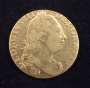A George III 1776 gold fourth head guinea, VG