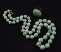 A single strand graduated jadeite bead necklace, with gold clasp, 18in, together with a 9ct white