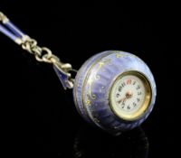 An early 20th century continental silver and blue guilloche enamel globe fob watch, with Arabic dial