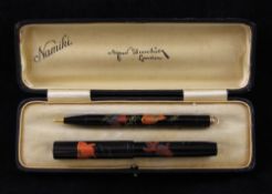 An Alfred Dunhill Namiki lacquered lady's writing set, including a small fountain pen with a no.2