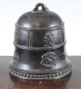 A Chinese or Japanese bronze small temple bell, cast in relief with characters and chi-dragon