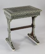 A 19th century Anglo-Indian ivory, sadeli and sandalwood work table, the hinged top revealing a