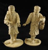 A pair of Japanese bone and ivory sectional figures of fruit pickers, early 20th century, 21cm and