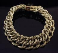 An 18ct gold multi rope twist link bracelet, 80 grams, 8.25in.