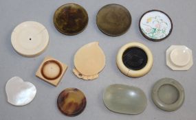 A collection of Chinese snuff trays, 19th-20th century, two of pale celadon jade, five of ivory, one