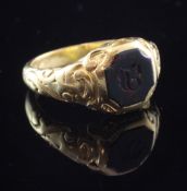 A William IV 18ct gold and bloodstone set gentleman's mourning ring, with carved scroll shank,