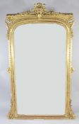A 19th century French giltwood and gesso pier glass, with acanthus C scroll and lion mask crest