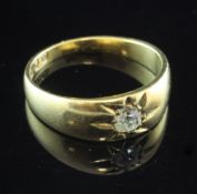 A Victorian 18ct gold gypsy set solitaire diamond ring, size O.