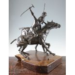 A 20th century bronze equestrian figure group, modelled as two polo players, on a polished walnut