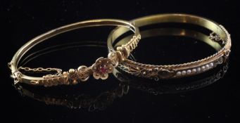 Two late Victorian 15ct gold and gem set hinged bracelets, both with with cannetile work