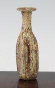 A Roman glass unguentarium, Syria 1st / 2nd century AD, the flute moulded body with cylindrical neck