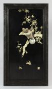 A Japanese mother of pearl, bone and lacquer panel, late 19th / early 20th century, decorated in