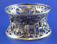 A George V silver dish ring, pierced and decorated with continuous farmyard scene, George