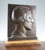 Sylvestre Clerc (French, 1892-1958). A rectangular bronze portrait plaque depicting a gentleman's