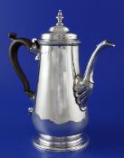 A George II silver coffee pot, of tapering cylindrical form, with turned finial and wooden scroll