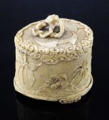 A Japanese ivory box and cover, Meiji period the tusk section finely carved in relief with a bat,