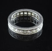 A platinum and princess cut diamond set full eternity ring, in Mappin & Webb box, size N.