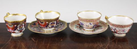 the two cups and a saucer decorated in polychrome enamels, one cup and saucer with a figure in a
