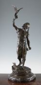 After Pierre Jules Mene. A patinated bronze figure of an Arab falconer, on a raised naturalistic