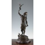 After Pierre Jules Mene. A patinated bronze figure of an Arab falconer, on a raised naturalistic