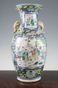 A Chinese famille verte two handled vase, late 19th / early 20th century, painted with figures and