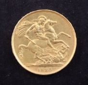 A George IV 1823 gold two pounds, near EF, mount mark to edge