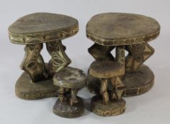 Papua New Guinea Sepik River, two tribal tables, each carved from a single section of tree trunk,