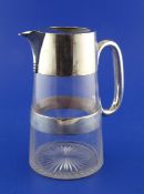 A late Victorian silver mounted glass lemonade jug by Mappin & Webb, of tapering cylindrical form,