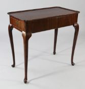 A George III mahogany rectangular silver table, with galleried top and re-entrant corners, fitted