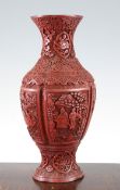 A Chinese cinnabar lacquer vase, 19th century, of quatre-lobed baluster form, carved in high
