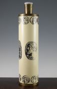 A Fornasetti type enamelled metal cylindrical table lamp, transfer printed with classical style