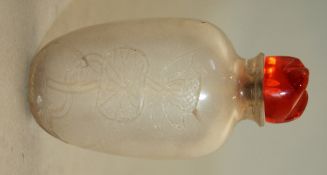 A Chinese rock crystal snuff bottle, 1850-1940, very well hollowed and engraved with lotus to one