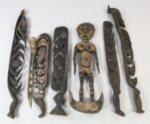 A Papua New Guinea Sepik River carved wooden tribal food hook, with painted female ancestor