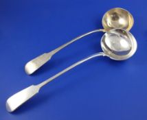 Two 19th century silver fiddle pattern soup ladles, one with engraved initials, Soloman Royes,