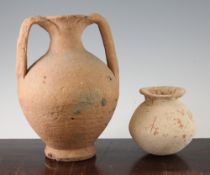 A Roman terracotta amphora and a Roman redware globular vase, c.2nd century AD, the amphora with