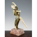 Eduardo Rossi (1867-1926). An Art Deco ivory and gilt bronze figure 'Oriental Dancer', modelled as a