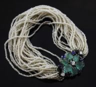 An Italian multi-strand seed pearl bracelet with 18ct white gold, emerald, sapphire and diamond