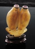 A Chinese chalcedony 'twin fish' snuff bottle, 1850-1920, with incised scales, 7.4cm, Richards no.