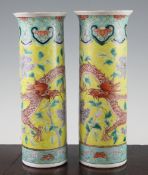 A pair of Chinese famille rose yellow ground sleeve vases, Kangxi mark, late 19th century, each